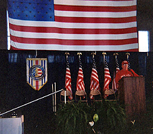 Bob Molloy tests mics at soldier's welcome home event